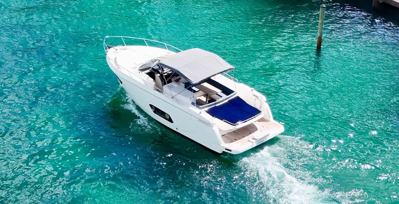 Slide: The Image of Luxury Absolute 40 yacht cruising in clear turquoise waters, 2014 model. - 40