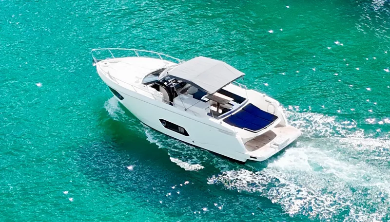 Slide: The Image of Luxurious 2014 Absolute 40 yacht cruising on clear turquoise waters. - 41