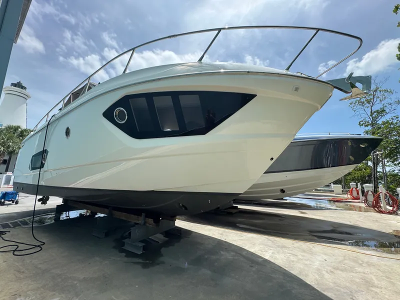 Slide: The Image of 2014 Absolute 40 yacht on dry dock under clear sky. - 42