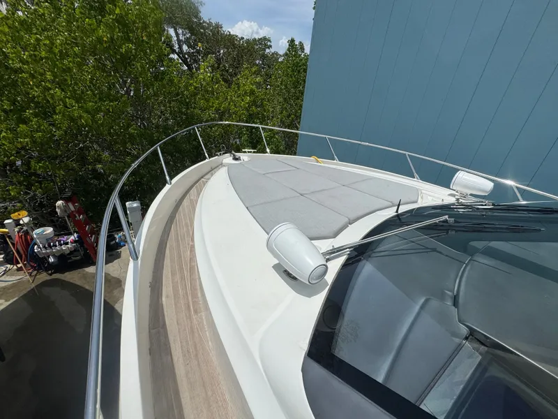 Slide: The Image of Deck view of a 2014 Absolute 40 yacht, featuring sleek design and modern amenities. - 49