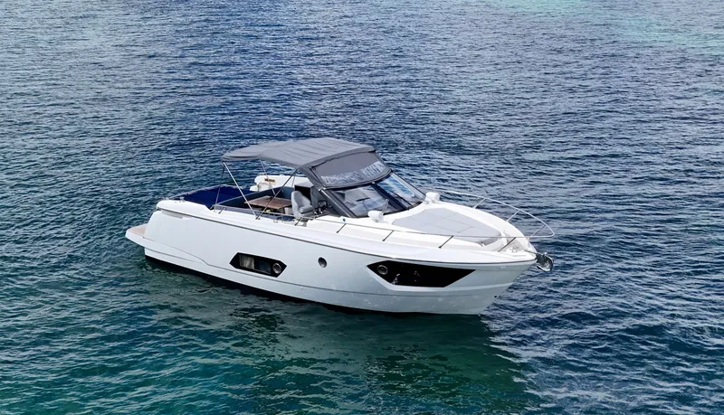 Slide: The Image of 2014 Absolute 40 yacht on calm blue waters. - 8