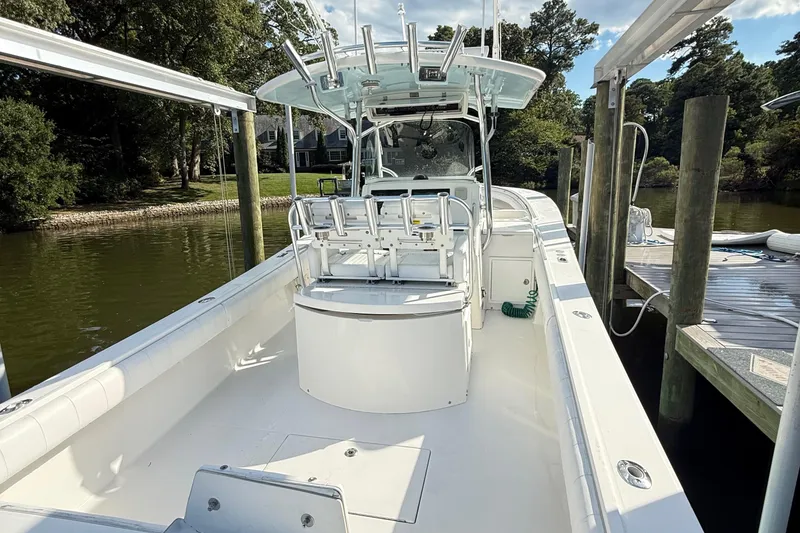 Slide: The Image of 2009 Regulator 34SS boat console with electronics, viewed from below, on a sunny day. - 14