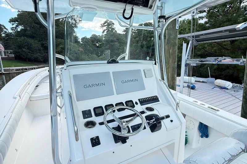 Slide: The Image of 2009 Regulator 34SS boat interior with compact cabin and amenities. - 28