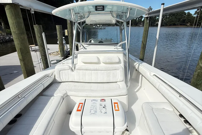 Slide: The Image of 2009 Regulator 34SS cabin interior with life jacket and storage space. - 29