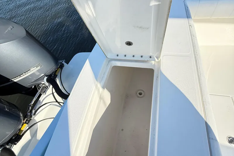 Slide: The Image of 2009 Regulator 34SS boat interior with rod holders and speaker. - 37