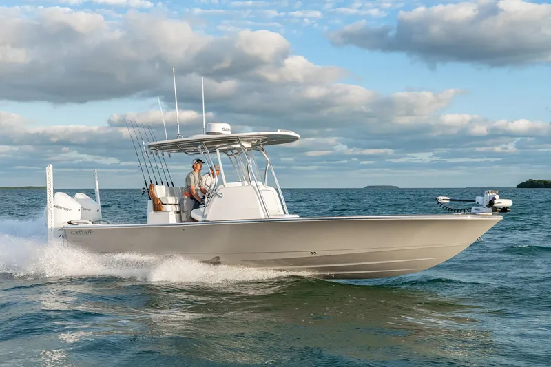 The Image of 2026 Valhalla Boatworks V-28 Bay cruising on open water under a cloudy sky. - 1