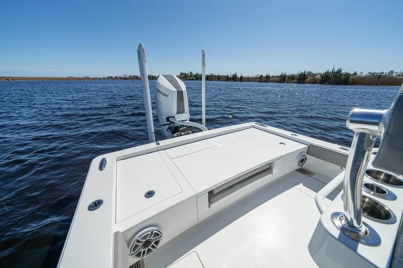 Slide: The Image of 2026 Valhalla Boatworks V-28 Bay on calm water, showcasing sleek design and powerful engine. - 3