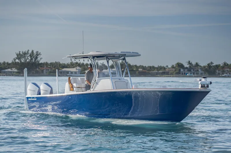 The Image of 2026 Valhalla Boatworks V-29 Hybrid cruising on calm waters, showcasing sleek design. - 1