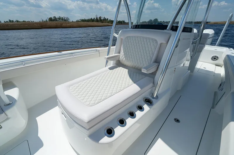 Slide: The Image of 2026 Valhalla Boatworks V-29 Hybrid with luxurious seating on a sunny day. - 5