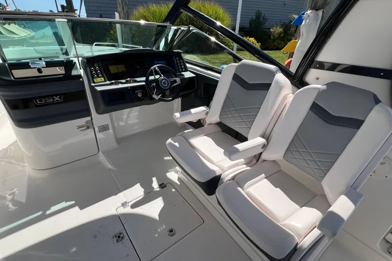 Slide: The Image of Interior of 2020 Chaparral 280 OSX boat with dual seats and modern dashboard. - 28