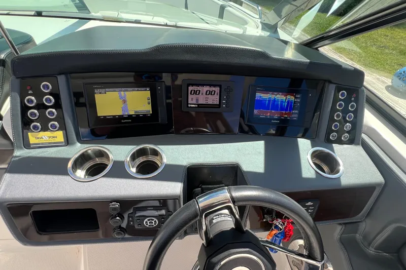 Slide: The Image of Dashboard of 2020 Chaparral 280 OSX boat with navigation and control systems. - 30