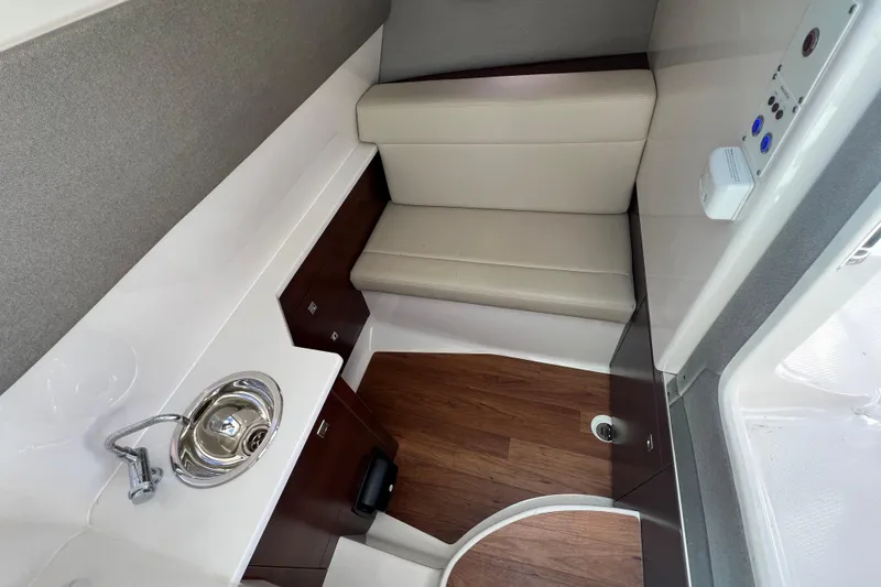 Slide: The Image of Interior of 2020 Chaparral 280 OSX boat with sink and seating area. - 34