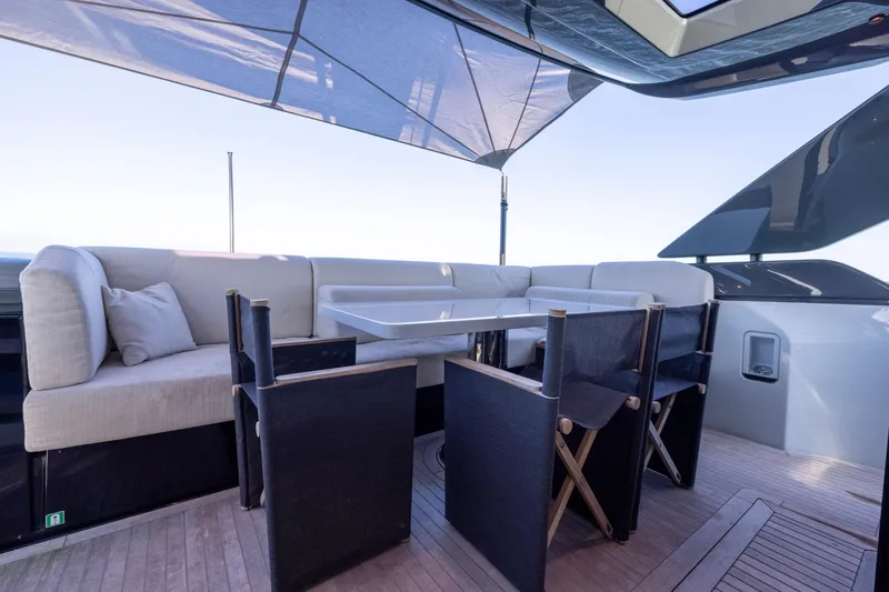 Slide: The Image of Luxurious outdoor seating on 2024 Bluegame BGX63 yacht with modern table and chairs. - 30