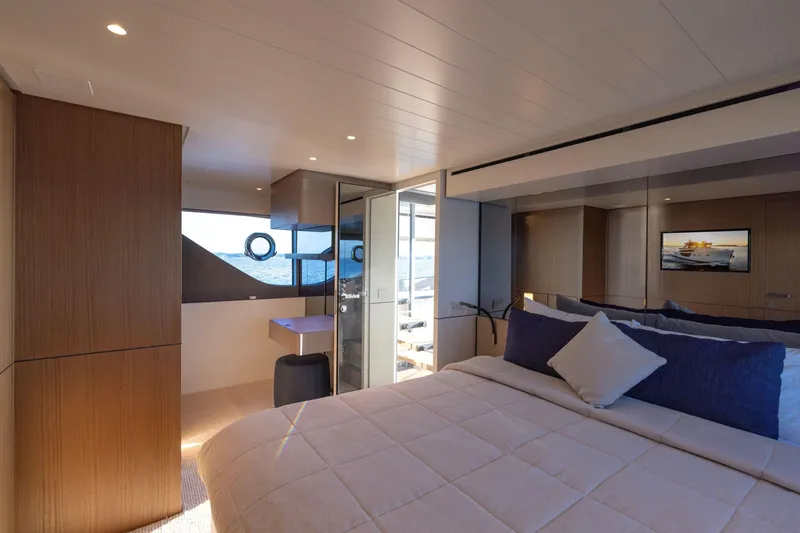 Slide: The Image of Luxurious interior of 2024 Bluegame BGX63 yacht with elegant bedroom and ocean view. - 51