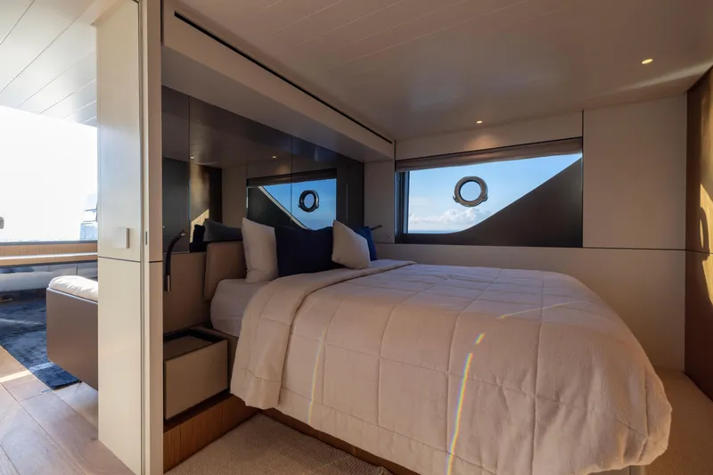 Slide: The Image of Luxurious bedroom interior of 2024 Bluegame BGX63 yacht with modern design and ocean view. - 52