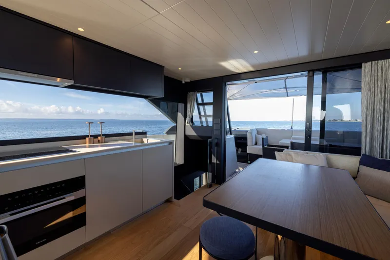 Slide: The Image of Luxurious interior of 2024 Bluegame BGX63 yacht with ocean view and modern kitchen. - 72