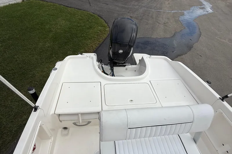 Slide: The Image of 2016 Bayliner Element F18 boat with outboard motor, viewed from above. - 15