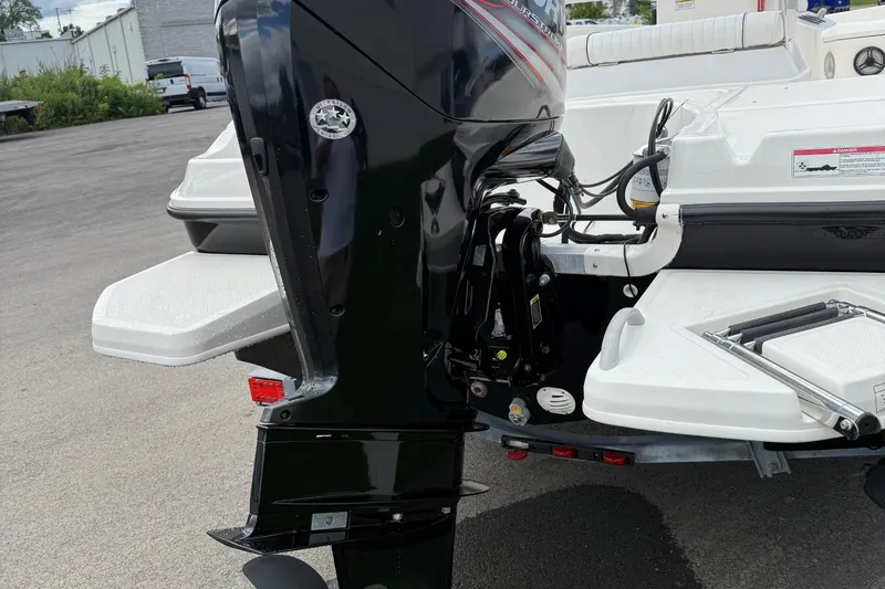Slide: The Image of 2016 Bayliner Element F18 boat with outboard motor and swim platform. - 5
