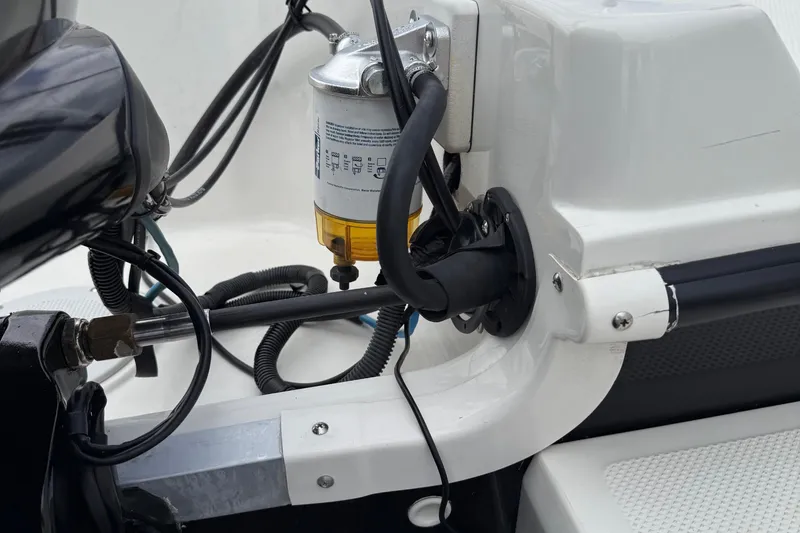 Slide: The Image of 2016 Bayliner Element F18 boat engine components and wiring close-up. - 8