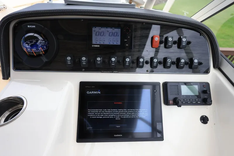 Slide: The Image of Control panel of 2018 Grady-White Freedom 285 boat with Garmin navigation system. - 20