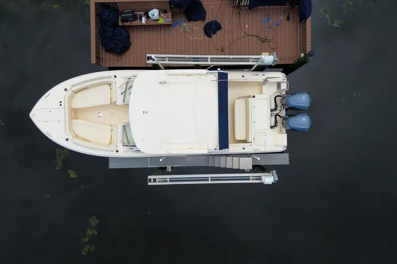 Slide: The Image of Overhead view of 2018 Grady-White Freedom 285 boat docked at a pier. - 3