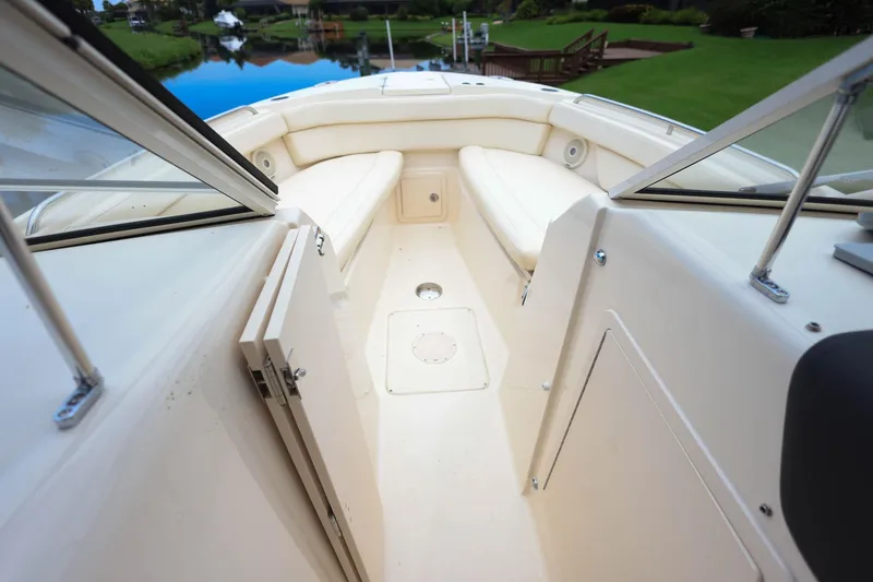 Slide: The Image of 2018 Grady-White Freedom 285 boat interior with spacious seating and open deck. - 34