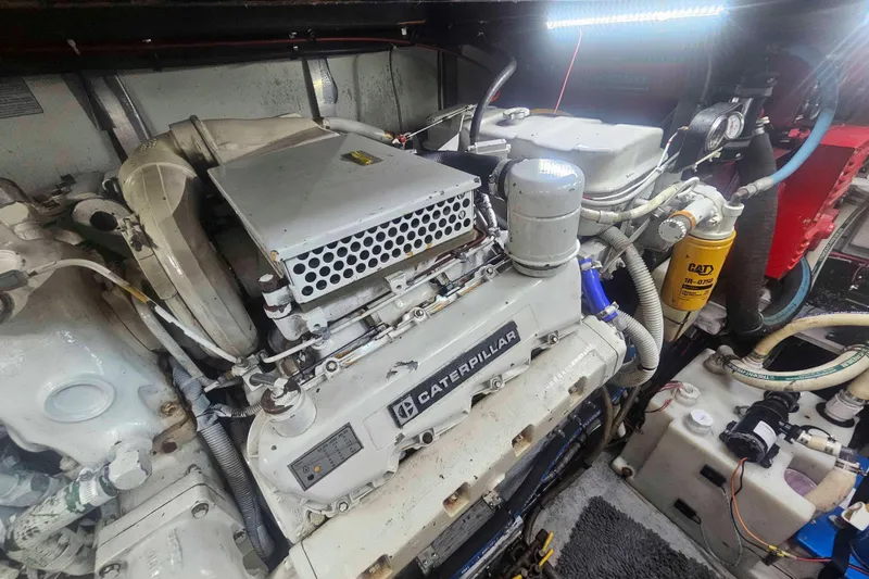 Slide: The Image of Engine room of a 1990 Sea Ray 440 Aft Cabin with Caterpillar engine. - 32