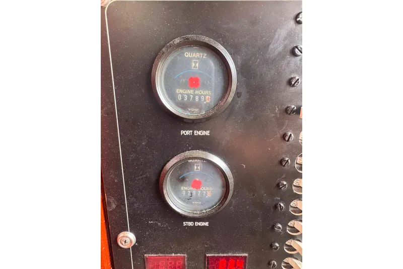 Slide: The Image of Close-up of engine hour meters on 1987 Chris-Craft 422 Commander boat. - 10
