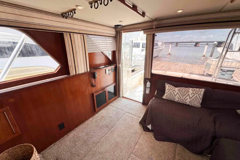 Slide: The Image of Interior of 1987 Chris-Craft 422 Commander yacht with dockside view. - 20