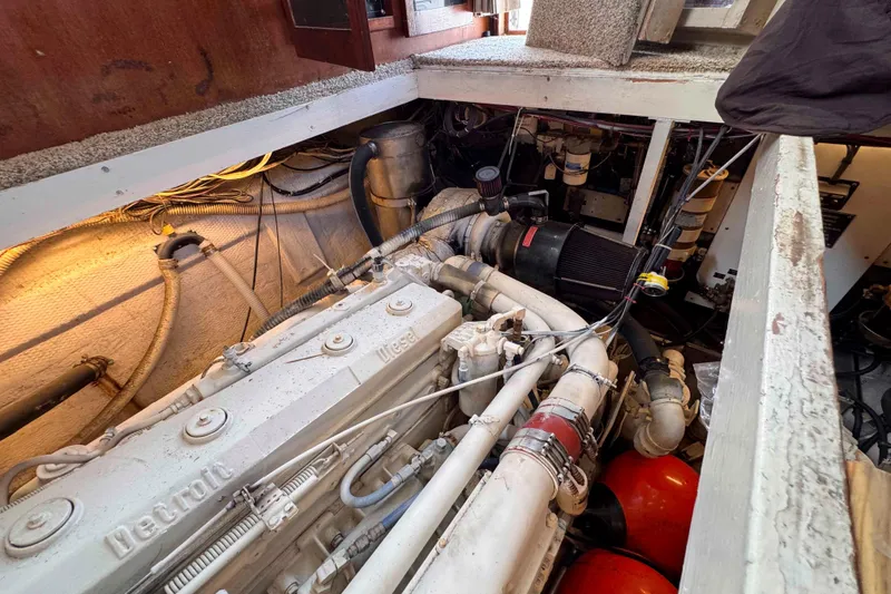Slide: The Image of Engine room of 1987 Chris-Craft 422 Commander with Detroit diesel engine. - 31