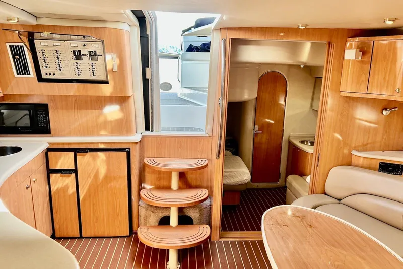 Slide: The Image of Interior of 2000 Regal Commodore 4160 yacht with wood finish and modern amenities. - 15