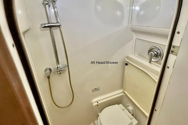 Slide: The Image of Aft head and shower in 2000 Regal Commodore 4160 boat. - 24