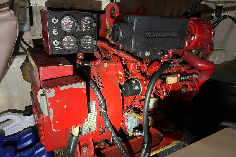 Slide: The Image of Red Westerbeke engine in a 2000 Regal Commodore 4160 boat. - 29