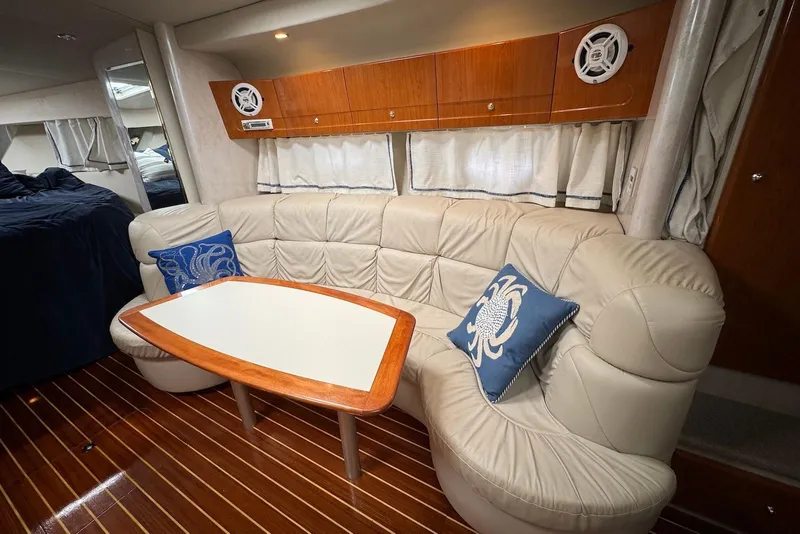 Slide: The Image of Luxurious interior of 2002 Formula 37 Performance Cruiser with plush seating and elegant wood accents. - 13
