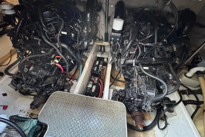 Slide: The Image of Engine compartment of a 2002 Formula 37 Performance Cruiser with dual engines and batteries. - 18