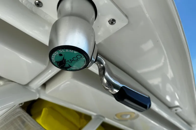 Slide: The Image of Taco Grand Slam handle on 2015 Sailfish 320 CC boat, close-up view. - 55