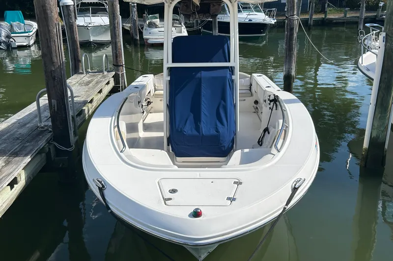 Slide: The Image of 2016 Robalo R200 Center Console boat docked in marina. - 3