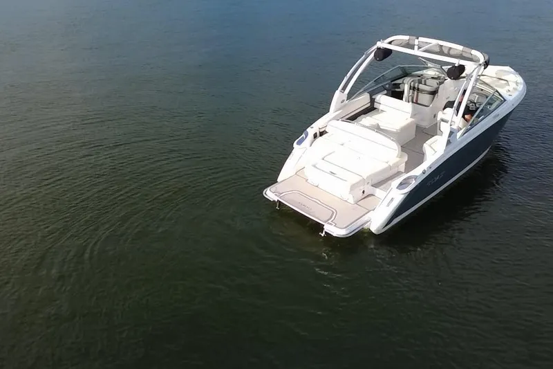 Slide: The Image of 2021 Cobalt R5 boat on calm water, aerial view. - 13