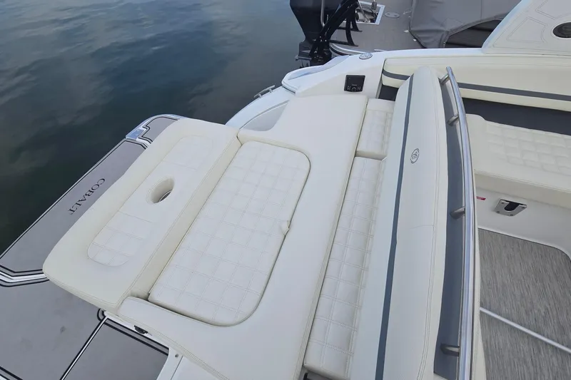 Slide: The Image of 2021 Cobalt R5 boat with luxurious white seating and sleek design. - 35