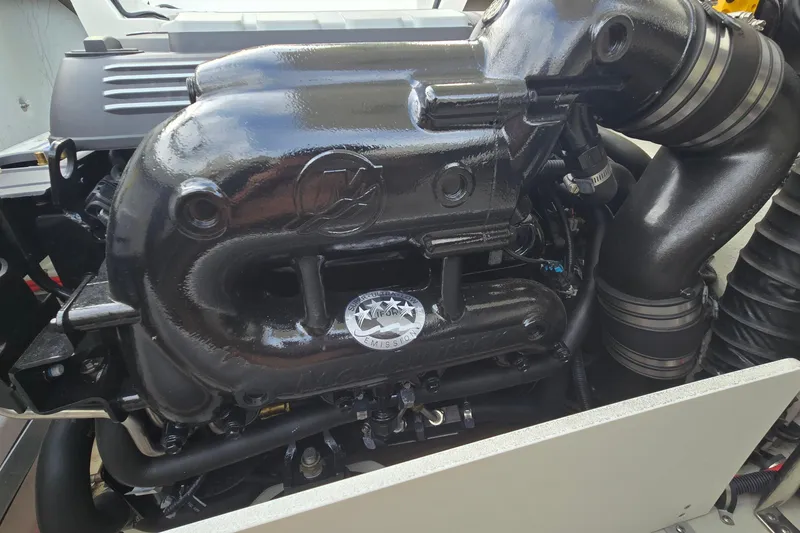 Slide: The Image of 2021 Cobalt R5 engine close-up, showcasing sleek black components and intricate detailing. - 42