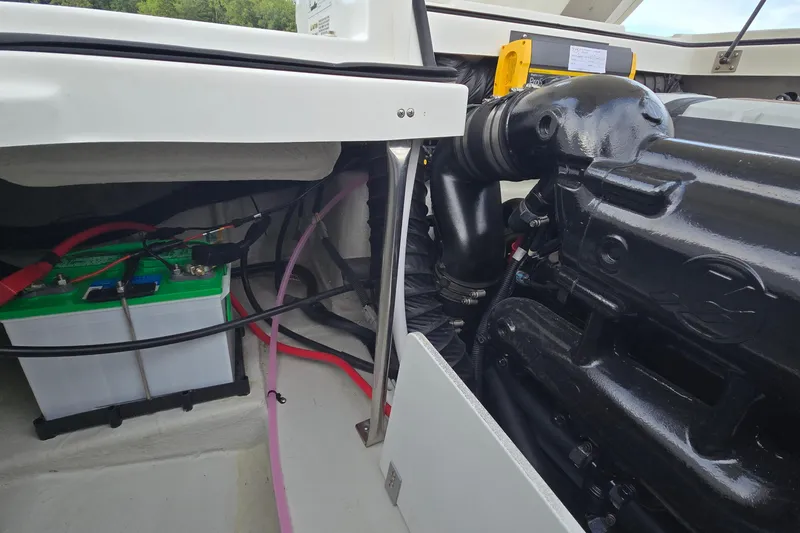 Slide: The Image of 2021 Cobalt R5 engine compartment with battery and wiring details. - 43