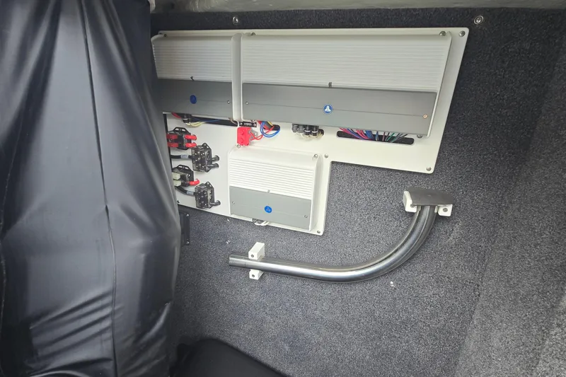 Slide: The Image of Electrical panel inside 2021 Cobalt R5 boat, featuring wiring and components. - 49