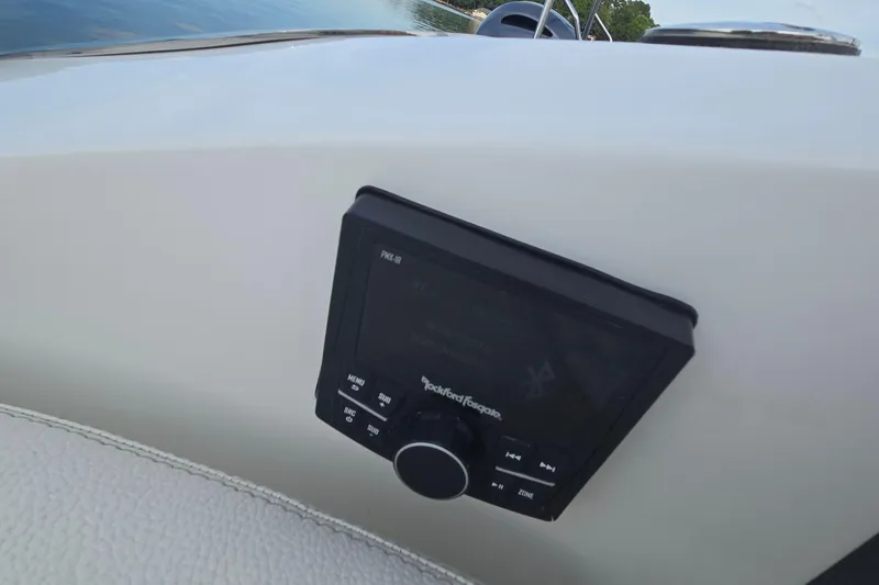 Slide: The Image of 2021 Cobalt R5 boat dashboard with Rockford Fosgate audio control panel. - 57