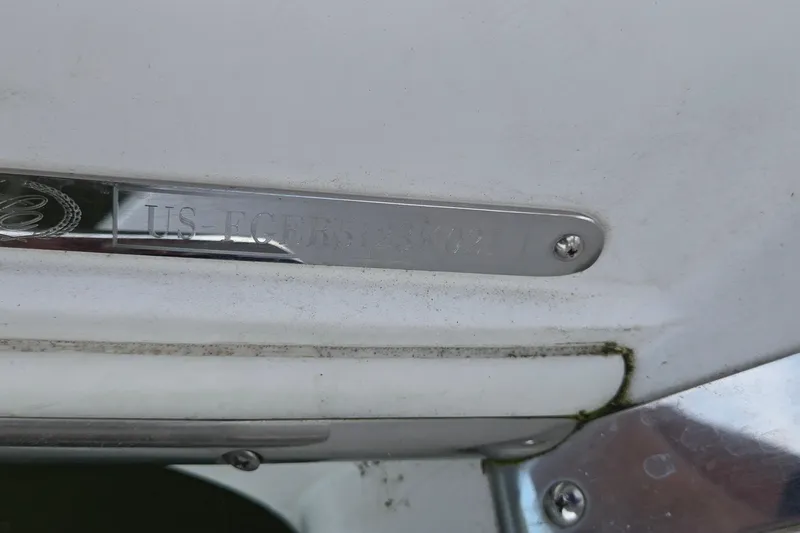 Slide: The Image of Close-up of a 2021 Cobalt R5 boat identification plate with visible serial number. - 59