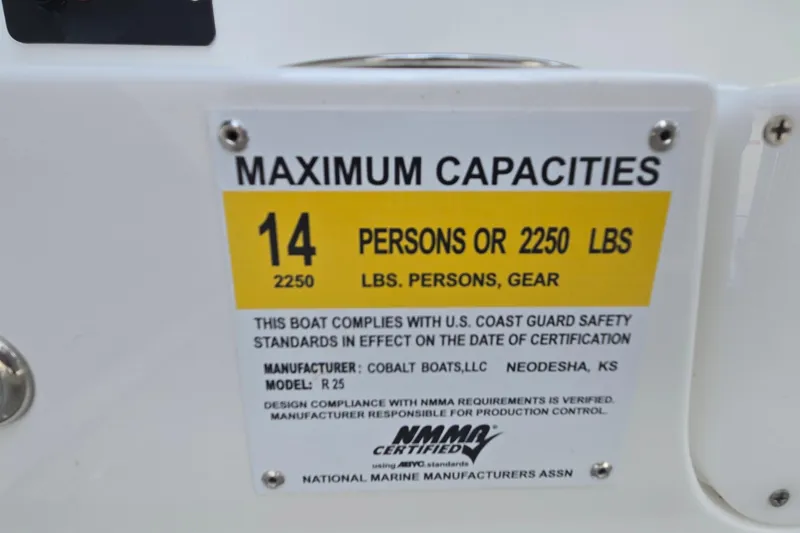 Slide: The Image of Maximum capacity label on 2021 Cobalt R5 boat, 14 persons or 2250 lbs. - 60