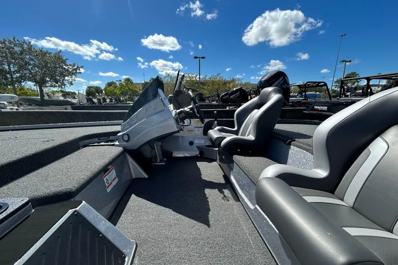 Slide: The Image of 2026 Nitro Z18 Pro boat interior with sleek seating and controls under a clear blue sky. - 6
