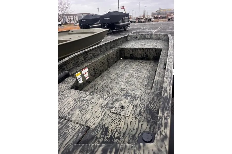 Slide: The Image of 2026 Tracker Grizzly 1650 T Prairie Wings Edition boat with camouflage design. - 33