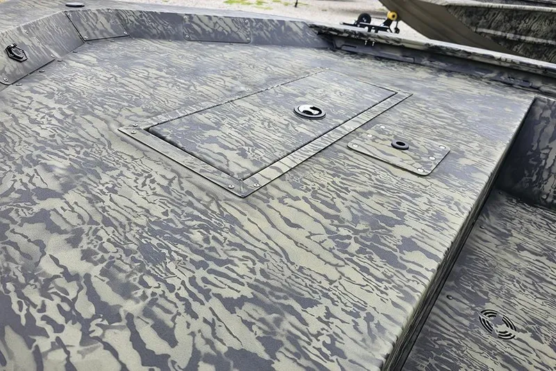 Slide: The Image of 2026 Tracker Grizzly 1648 SC boat with camouflage pattern deck. - 11