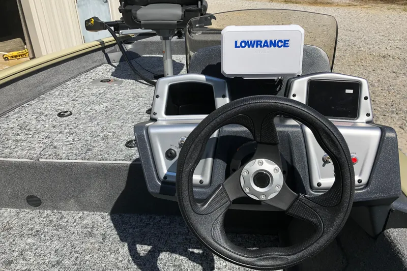 Slide: The Image of 2026 Tracker Pro Team 175 Crappie Edition boat dashboard with Lowrance electronics. - 11