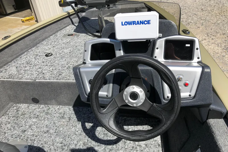 Slide: The Image of 2026 Tracker Pro Team 175 Crappie Edition boat dashboard with Lowrance electronics. - 12